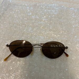 Gucci Sunglasses, never used. No visible scratches on lenses.